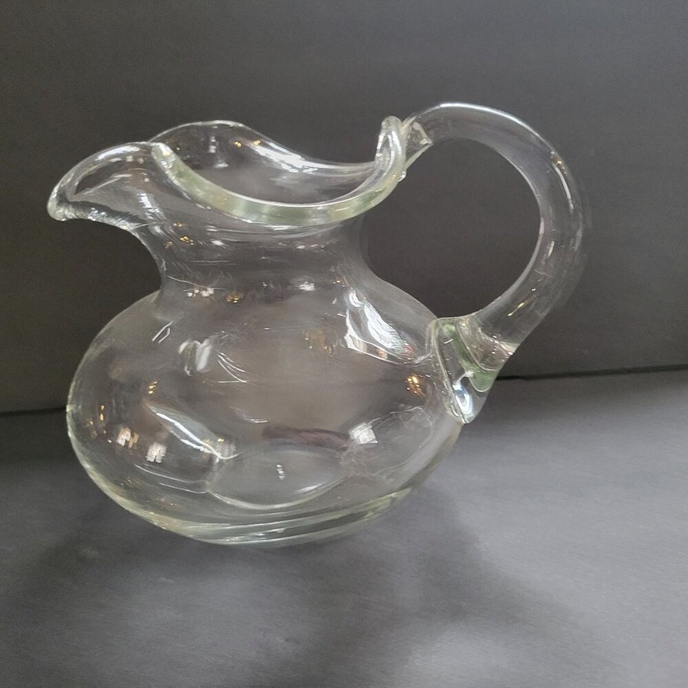 Ruffled Clear Glass Pitcher With Curved Handle & Wide Spout